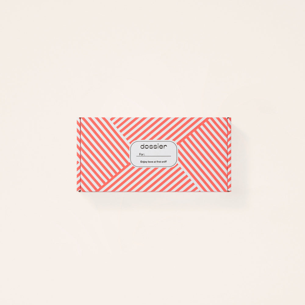 Gift box with Dossier logo on it